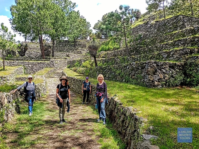 Reconstructed stone street and terraced structures at Cantona archaeological site in Puebla, Mexico.