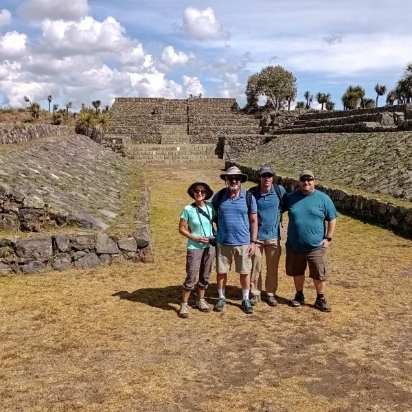 Friends visiting an ancient ballcourt at Cantona, exploring the legacy of Mexico’s pre-Hispanic civilizations.