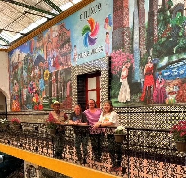 Murals celebrating Atlixco’s cultural identity painted on the walls of the Municipal Palace, showcasing local traditions, community pride, and artistic heritage.