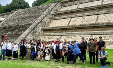 Visitors exploring the Toltec section of the Great Pyramid of Cholula, uncovering layers of ancient Mesoamerican history and architectural evolution beneath the iconic temple.