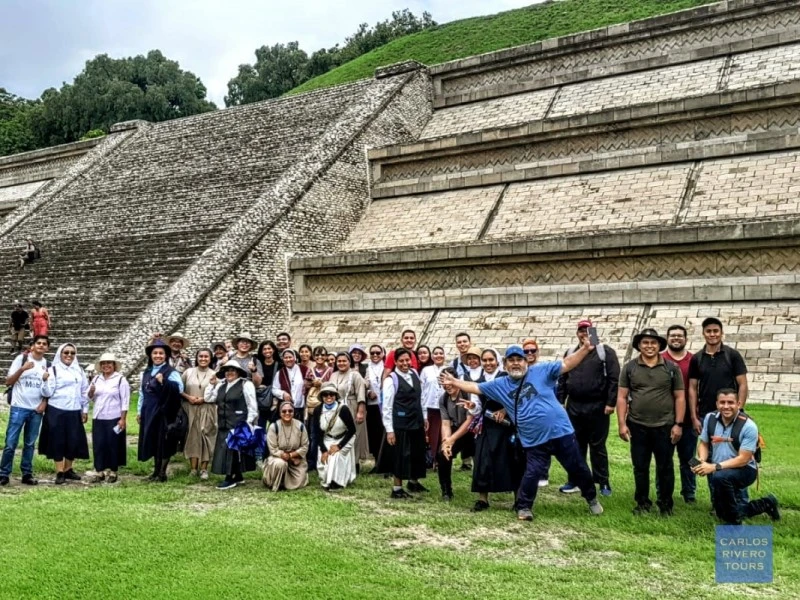 Visitors exploring the Toltec section of the Great Pyramid of Cholula, uncovering layers of ancient Mesoamerican history and architectural evolution beneath the iconic temple.