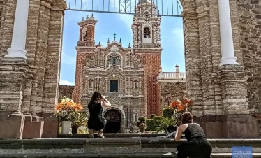 Visitors exploring Cholula’s iconic churches filled with baroque art and spiritual devotion, reflecting centuries of religious heritage and indigenous influence.