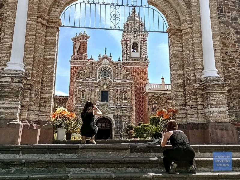 Visitors exploring Cholula’s iconic churches filled with baroque art and spiritual devotion, reflecting centuries of religious heritage and indigenous influence.