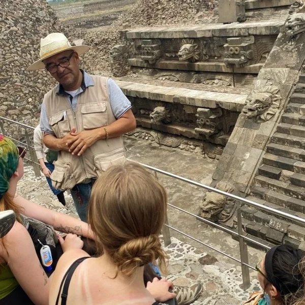 Cultural guide explaining the Pyramid of the Feathered Serpent at Teotihuacan, highlighting the symbolism of Quetzalcoatl in ancient Mesoamerican mythology and sacred architecture.