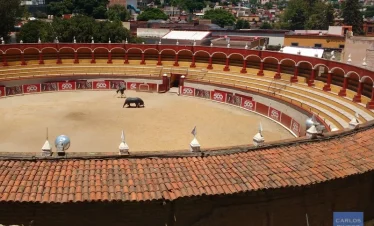 View of Tlaxcala’s historic bullring, Plaza de Toros Jorge 'El Ranchero' Aguilar, with its colonial architecture, open arena, and significance in traditional festivities.