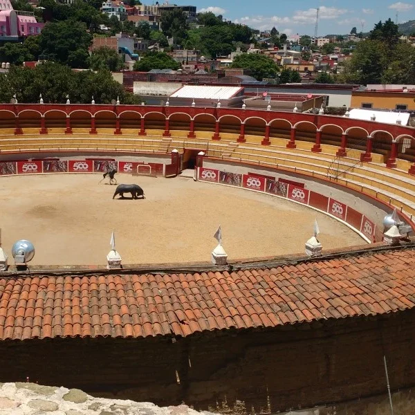 View of Tlaxcala’s historic bullring, Plaza de Toros Jorge 'El Ranchero' Aguilar, with its colonial architecture, open arena, and significance in traditional festivities.