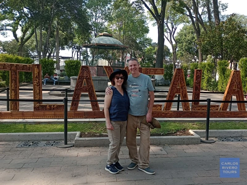 View of Tlaxcala’s city sign at the Zócalo, surrounded by colonial buildings and local charm, capturing the welcoming spirit of one of Mexico’s oldest cities.