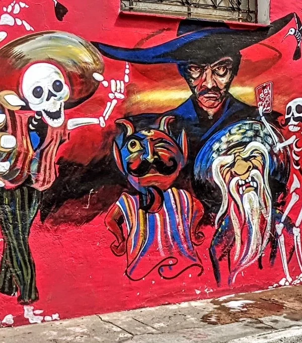 Murals in Atlixco celebrating Day of the Dead in Puebla with colorful tradition"