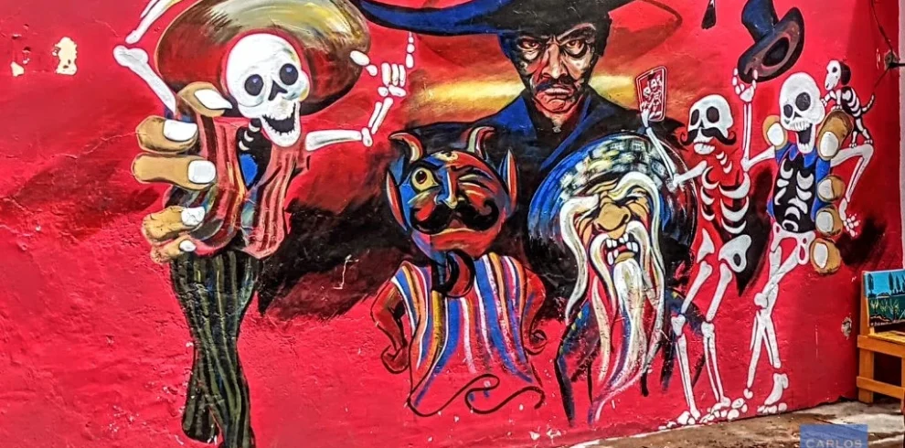 Murals in Atlixco celebrating Day of the Dead in Puebla with colorful tradition"