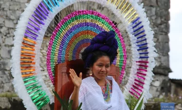 An indigenous woman crowned queen at the Cuetzalan Textile Festival in Mexico.