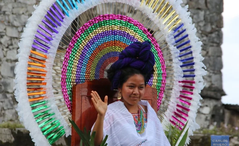 An indigenous woman crowned queen at the Cuetzalan Textile Festival in Mexico.