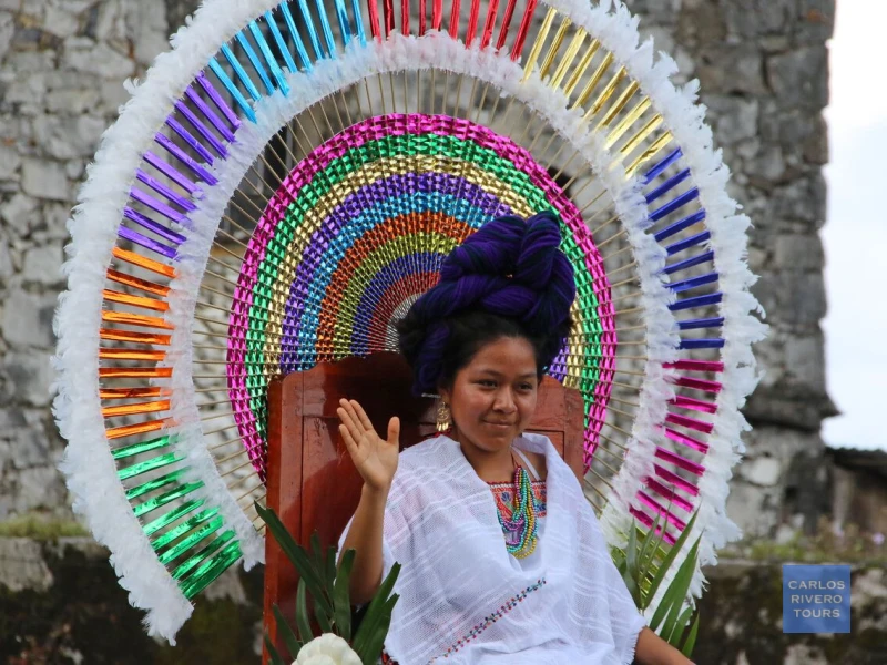 An indigenous woman crowned queen at the Cuetzalan Textile Festival in Mexico.