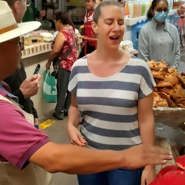 Local ingredients explained by a culinary guide in Puebla market – showcasing seasonal produce and cultural food traditions,