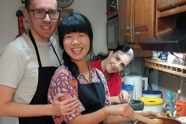 Couples and food lovers enjoying an award-winning immersive Mexican cooking masterclass in Puebla